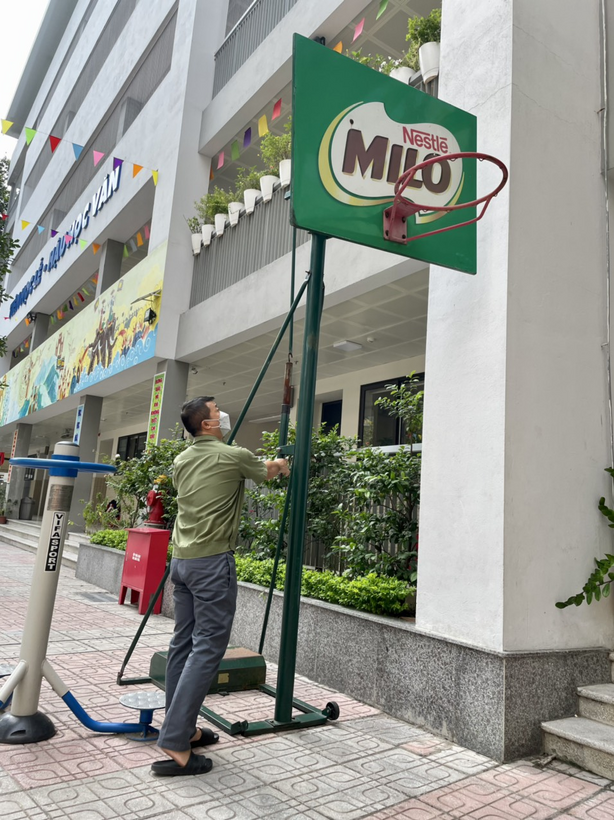 A picture containing text, outdoor, ground, sidewalk
Description automatically generated