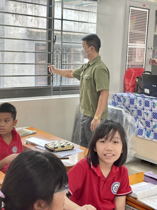 A picture containing person, child, indoor, child
Description automatically generated