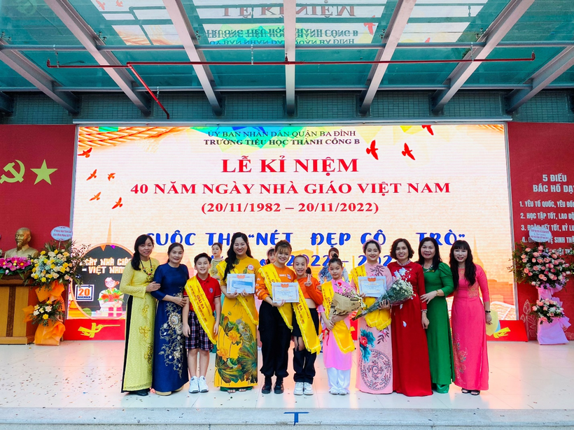 A picture containing text, group
Description automatically generated