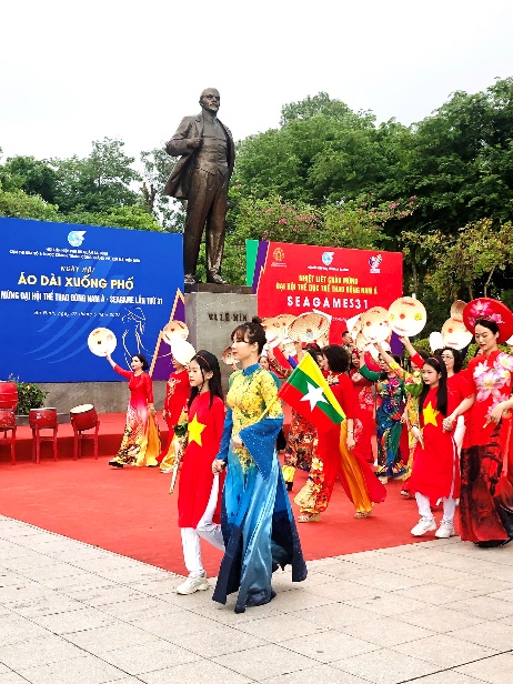 A picture containing text, outdoor, tree, ground

Description automatically generated