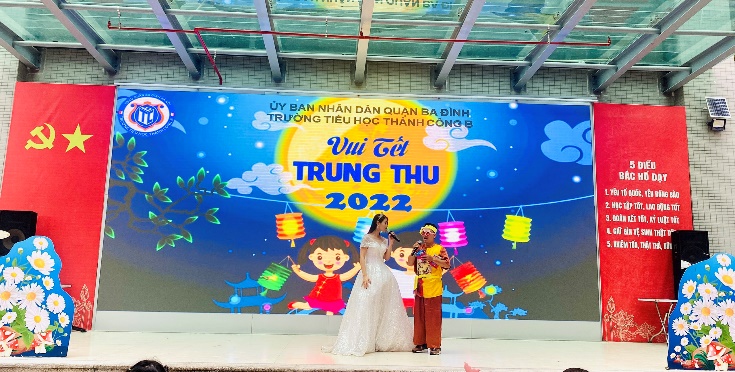 A group of people dancing on a stage

Description automatically generated with low confidence