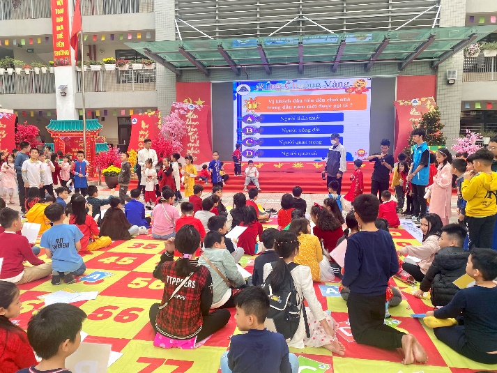 A group of people in a room
Description automatically generated with low confidence