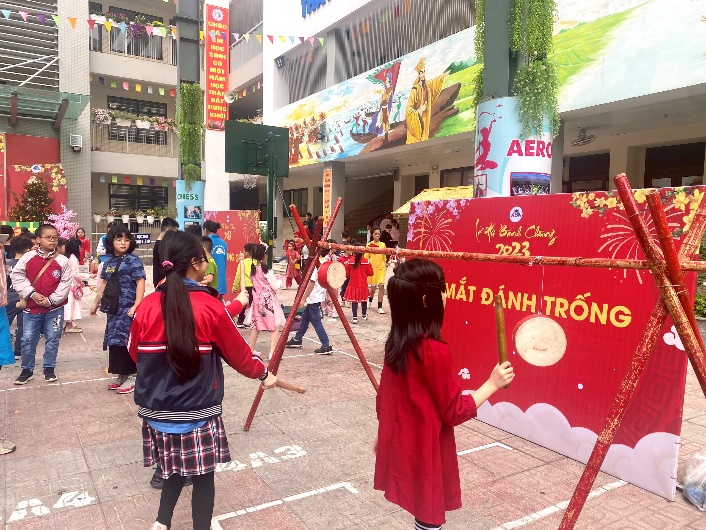 A picture containing building, outdoor, ground, person
Description automatically generated