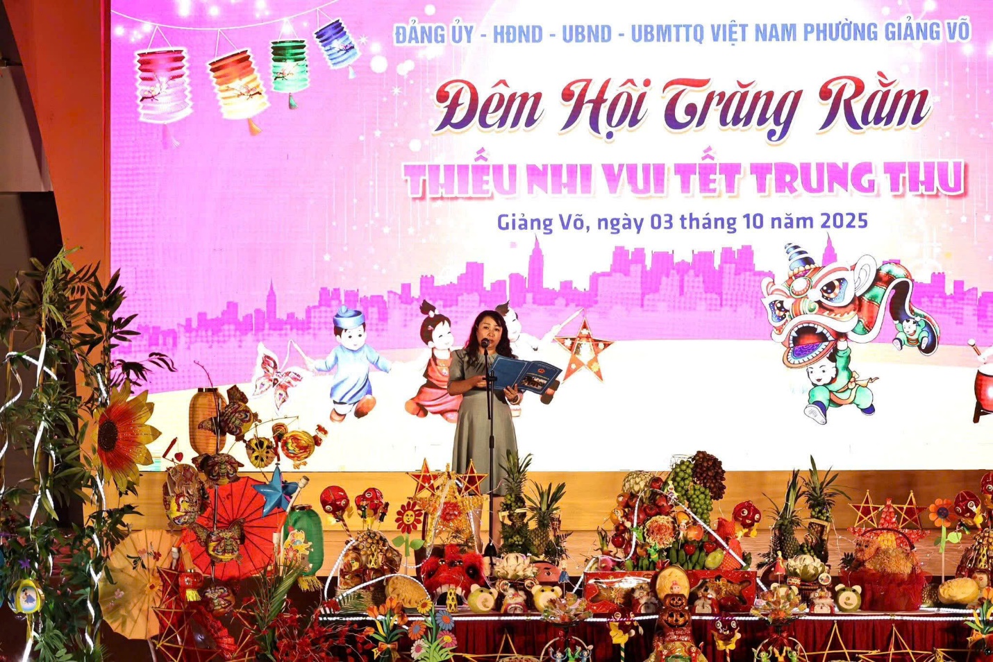 A person on a stage with a stage with a stage with a stage with a stage with a stage with a stage with a stage with a stage with a stage with a stage with a stage with
Description automatically generated