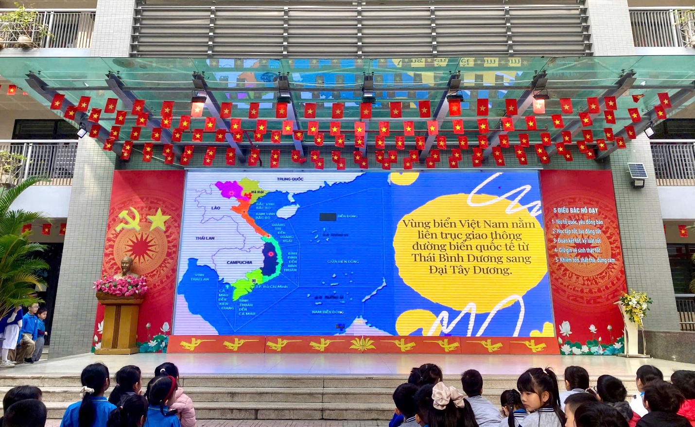 A group of children sitting on stairs
AI-generated content may be incorrect.