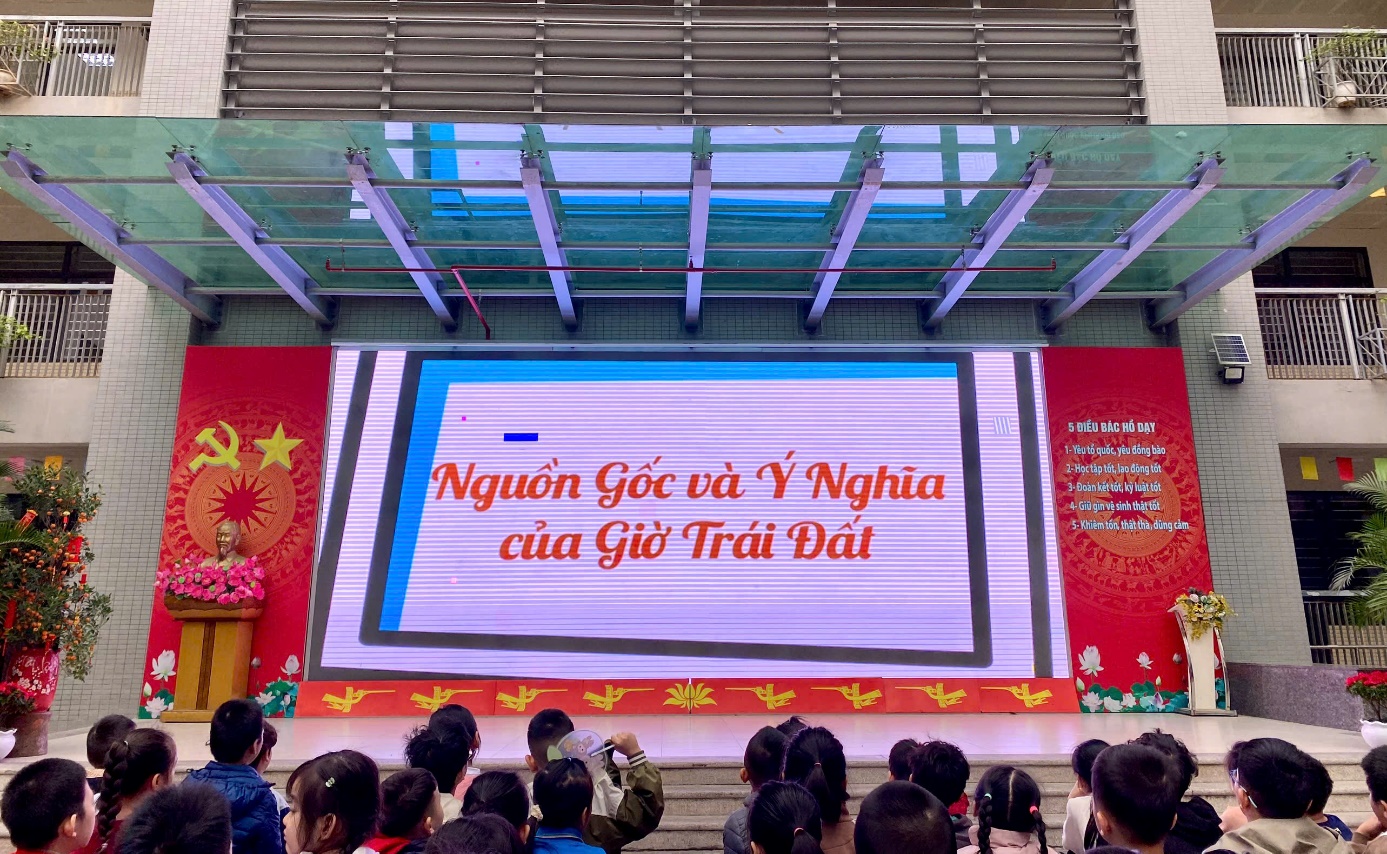 A group of people standing on stairs
Description automatically generated