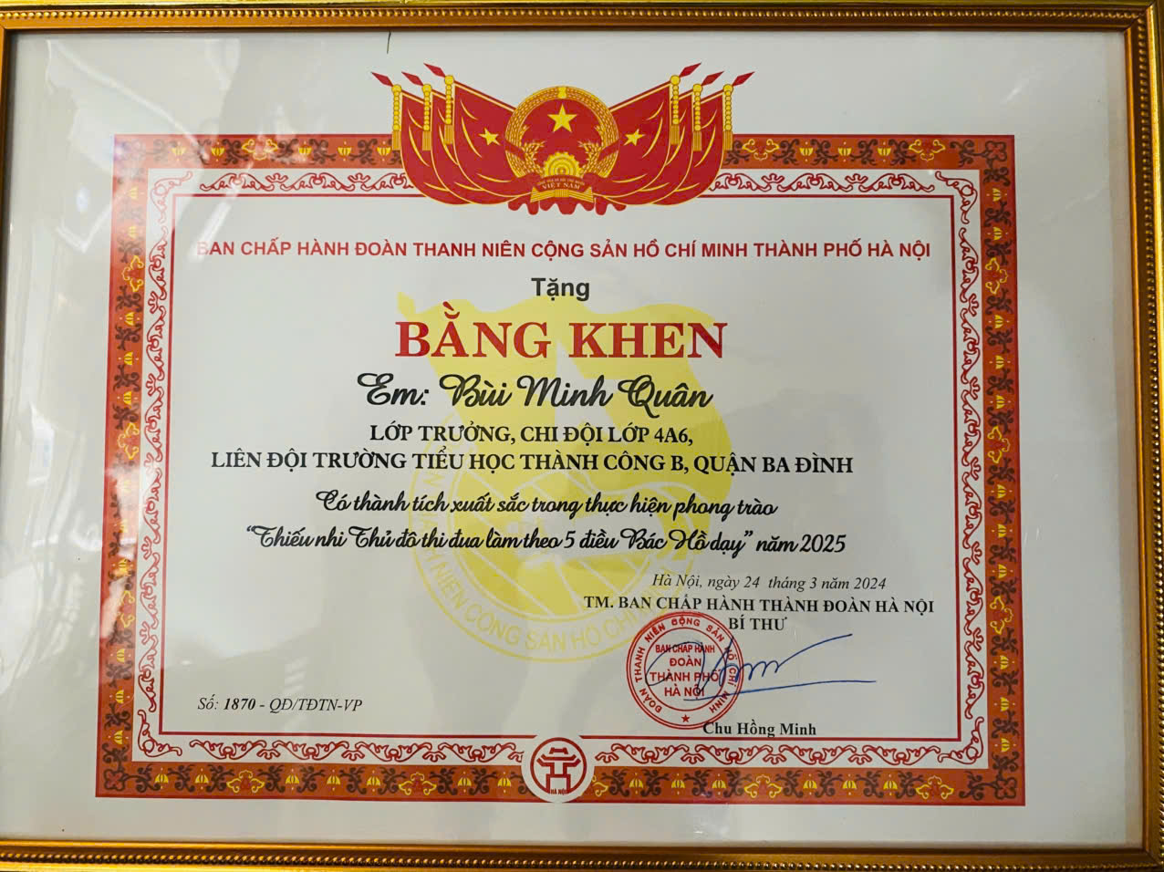 A certificate with a gold frame

Description automatically generated