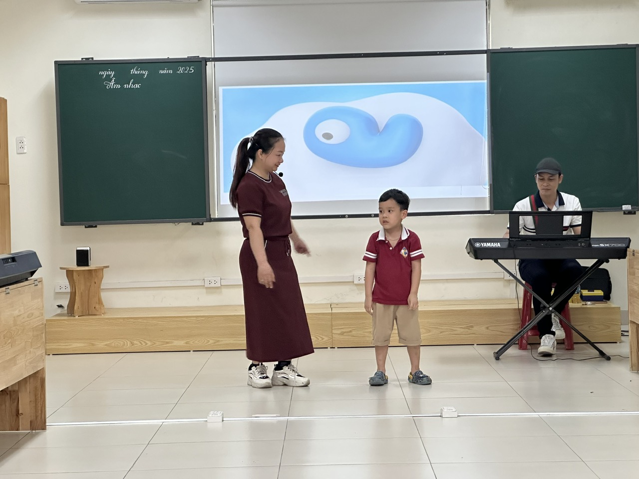 A person and a child standing in front of a screen

AI-generated content may be incorrect.