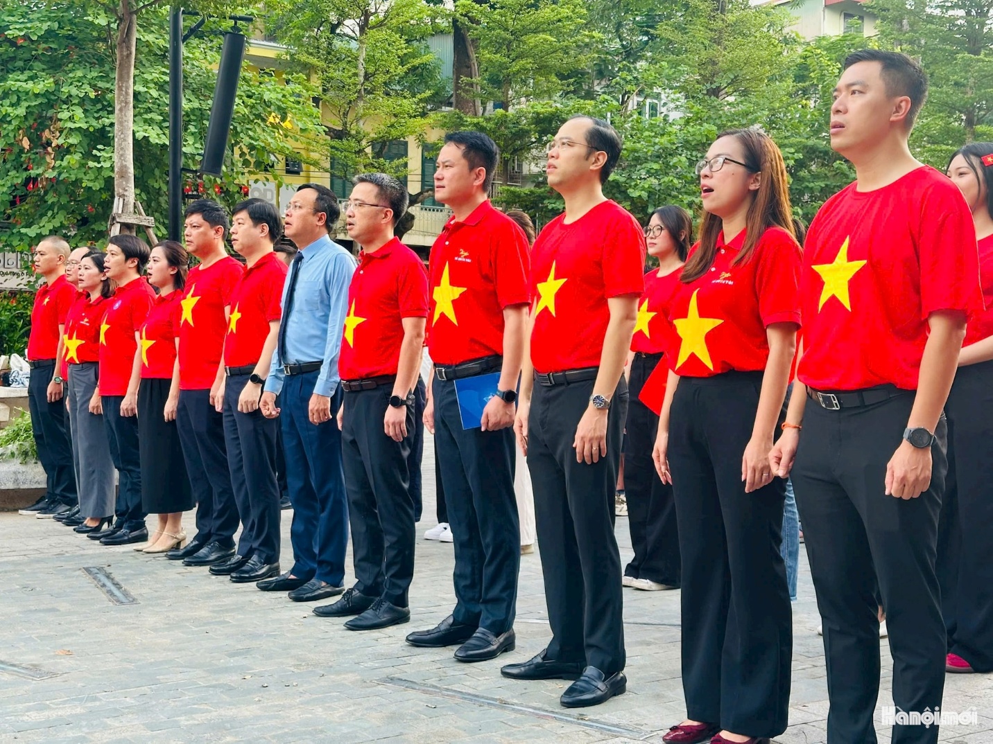A group of people in red shirts
AI-generated content may be incorrect.