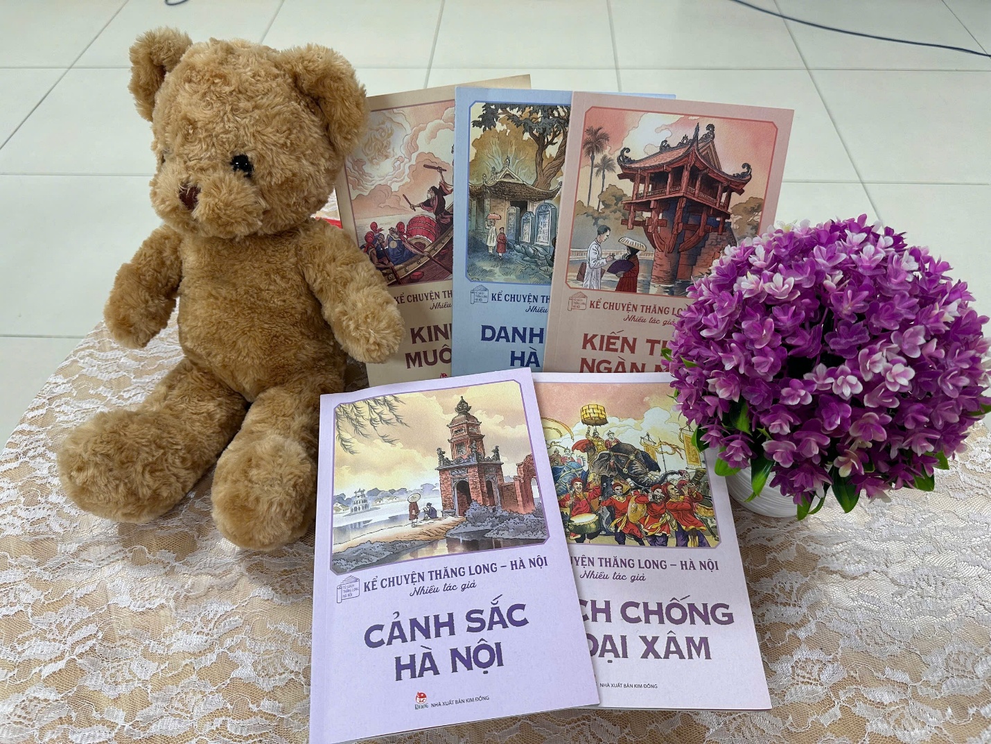 A teddy bear next to a bunch of cards

AI-generated content may be incorrect.